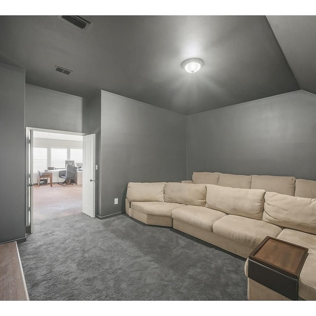 20358 Mathis Landing Drive Cypress, TX 77433 - Photo 20 of 32 a living room with furniture and a couch