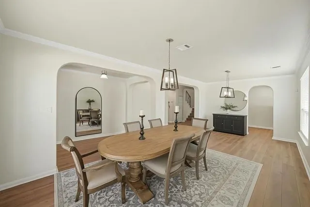 a view of a dining room with furniture