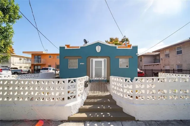 a view of a living room with a large bed
