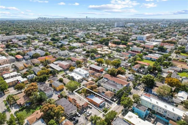 an aerial view of a city with lots of residential buildings