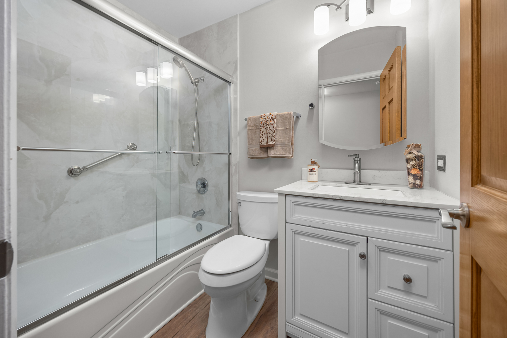 1505 Chartwell Road Hoffman Estates, IL 60169 - Photo 24 of 38 a bathroom with a sink a toilet and shower