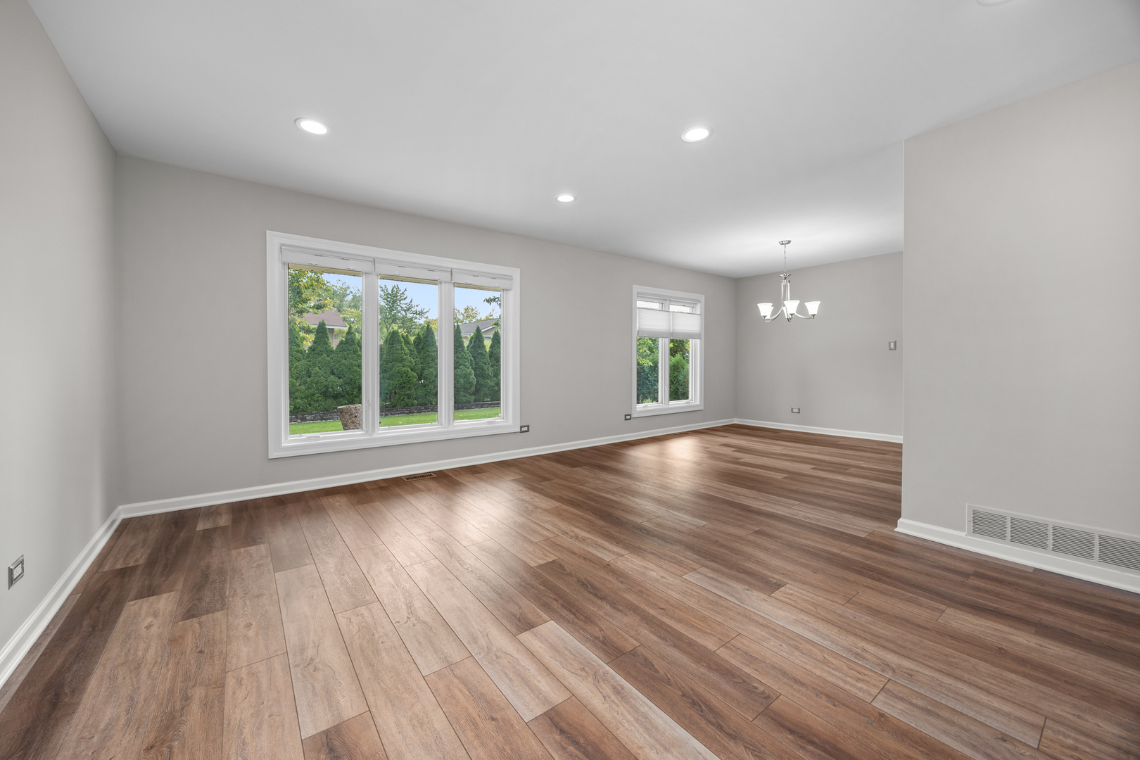 1505 Chartwell Road Hoffman Estates, IL 60169 - Photo 6 of 38 a view of room with window and wooden floor
