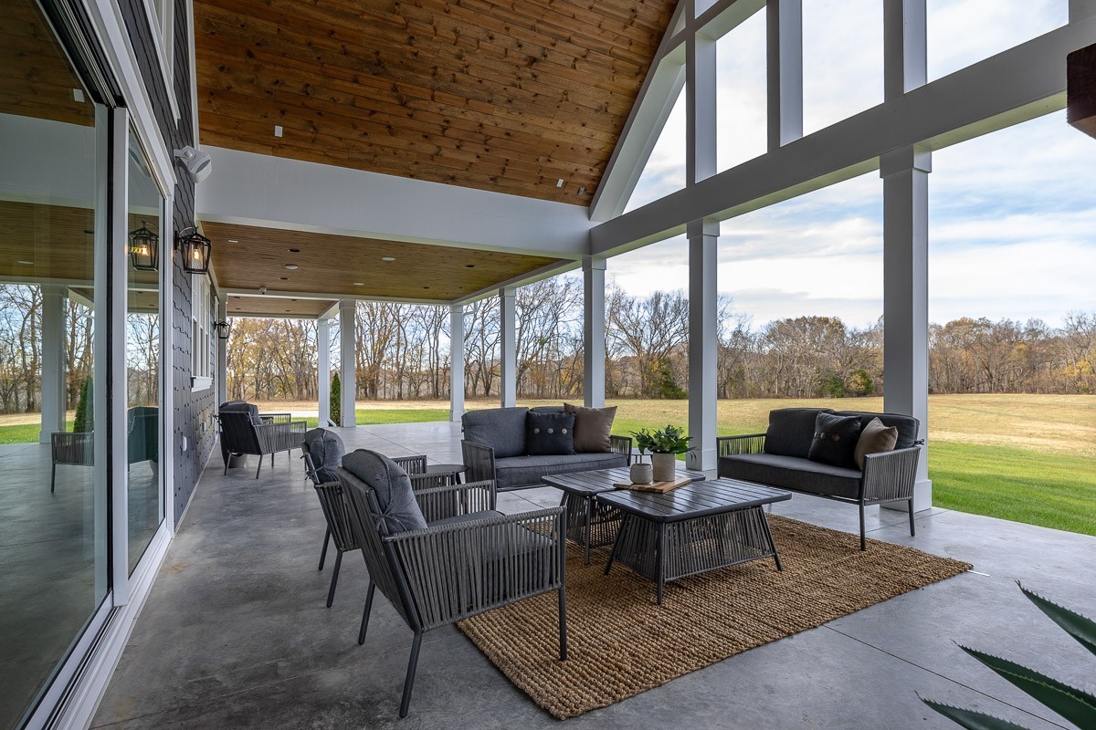 6876 Cross Keys Road College Grove, TN 37046 - Photo 34 of 58 a living room with furniture and a large window