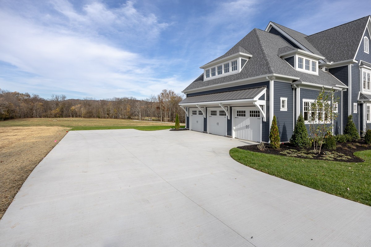 6876 Cross Keys Road College Grove, TN 37046 - Photo 40 of 58 a view of house with yard and swimming pool