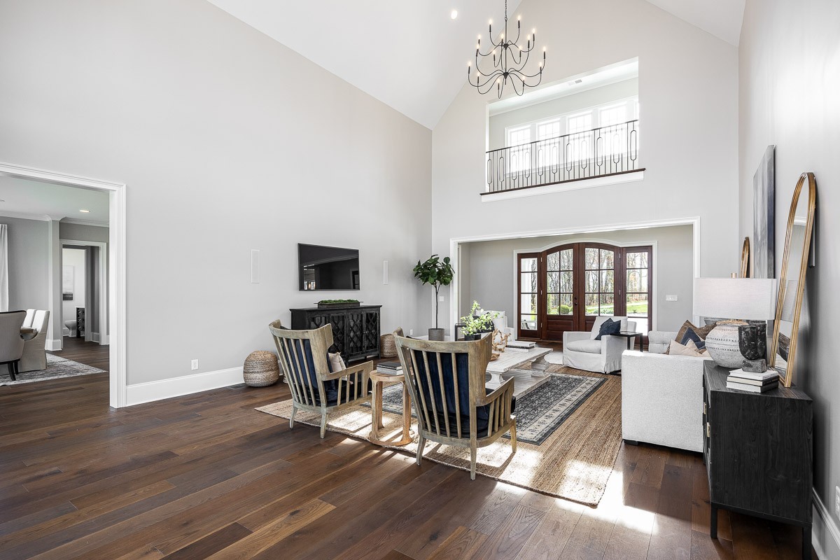 6876 Cross Keys Road College Grove, TN 37046 - Photo 5 of 58 a living room with furniture a fireplace and a flat screen tv