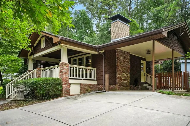 a front view of a house with garage