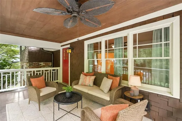 a outdoor living space with furniture and a window