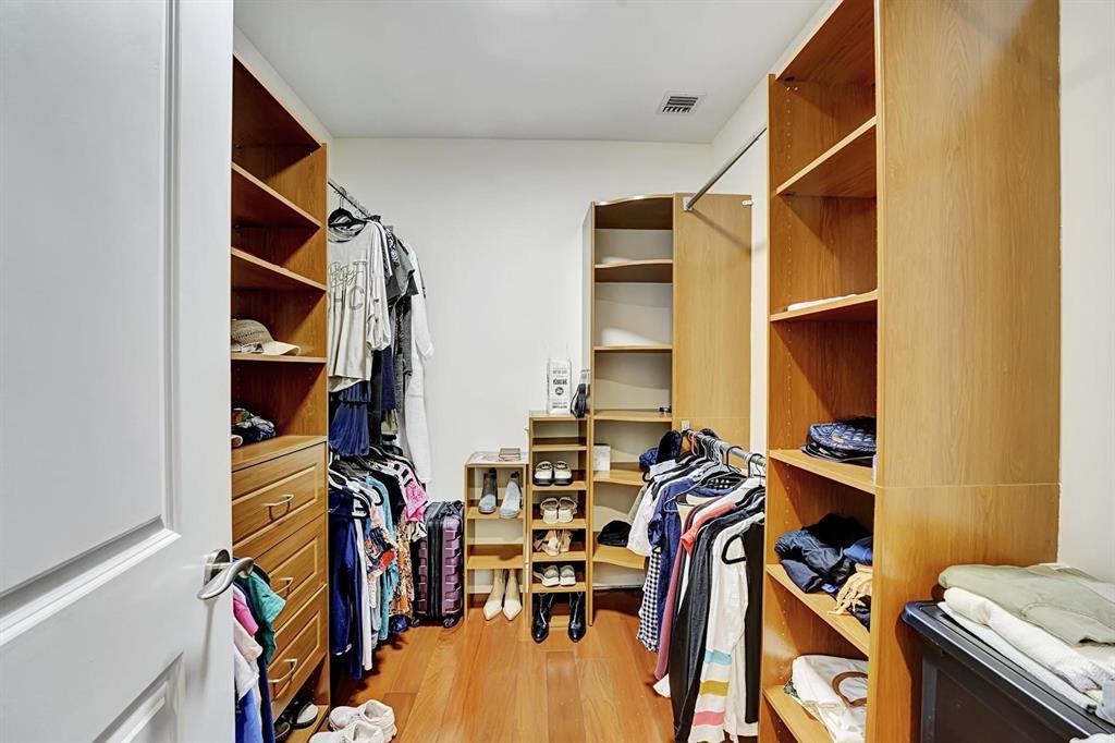 1 North Ocean Boulevard, Unit 403 Boca Raton, FL 33432 - Photo 14 of 46 walk in closet with clothes and shoes