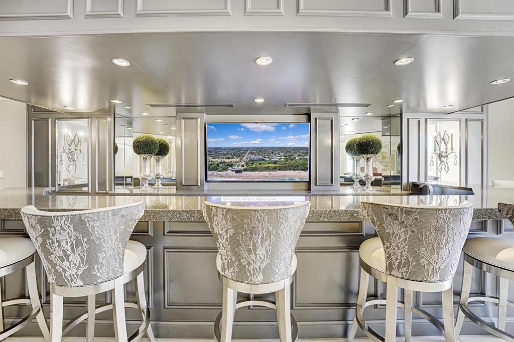 1 North Ocean Boulevard, Unit 403 Boca Raton, FL 33432 - Photo 29 of 46 a dining table with chairs and window