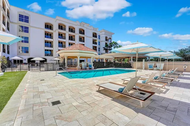 a view of an buildings with swimming pool
