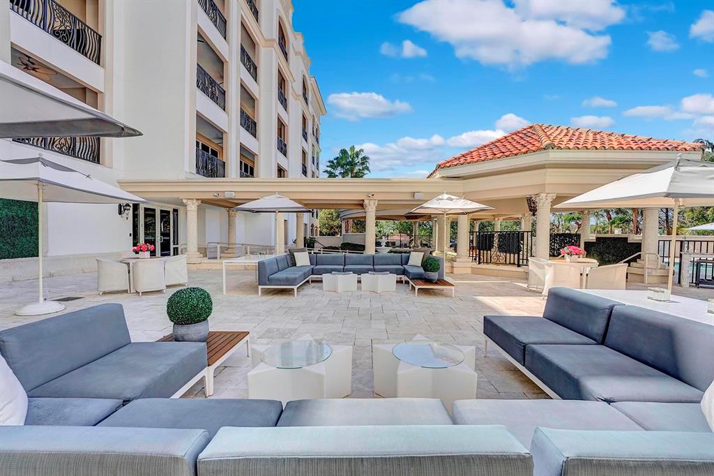 1 North Ocean Boulevard, Unit 403 Boca Raton, FL 33432 - Photo 40 of 46 a view of a building with couches table and chairs