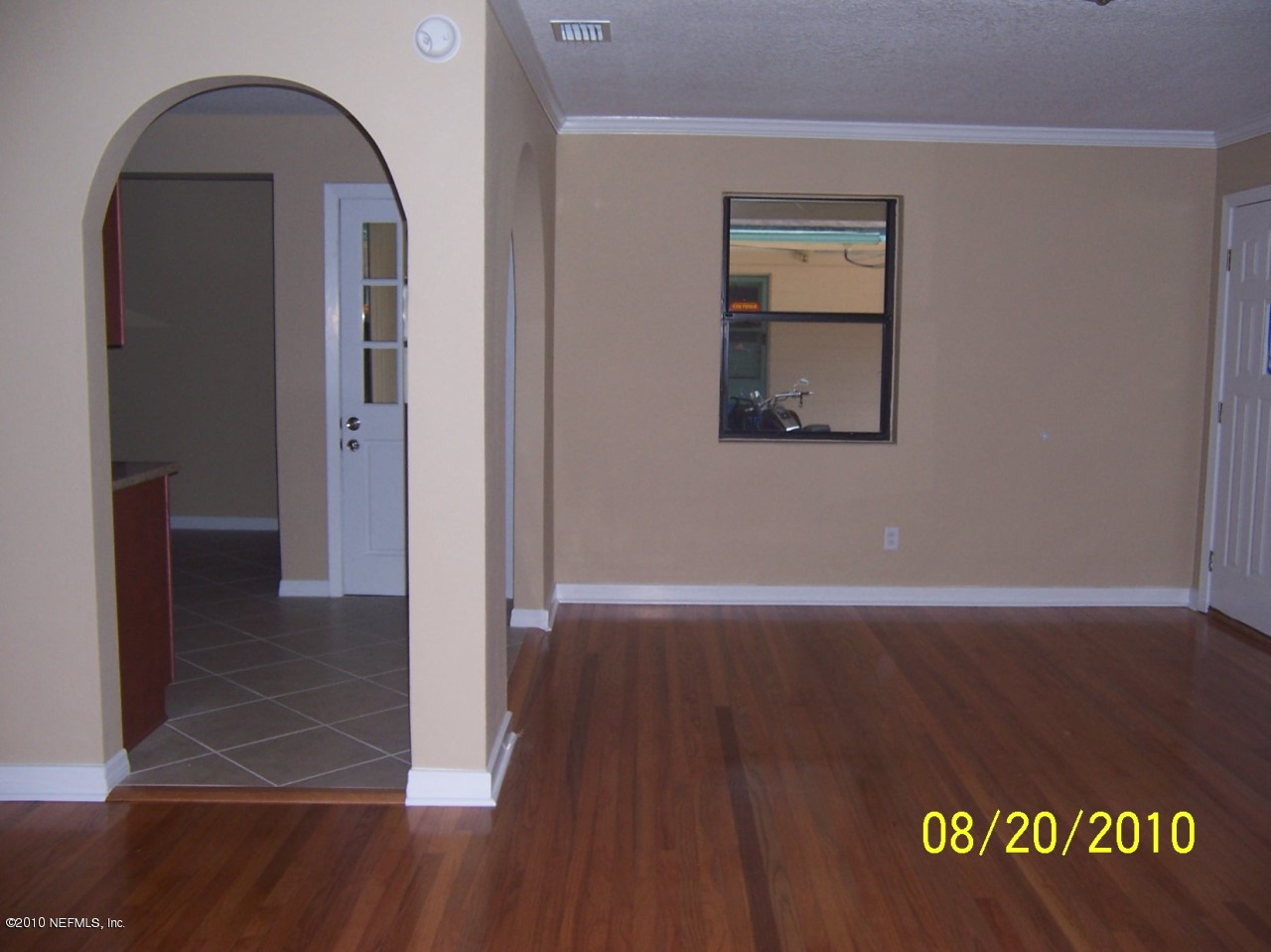 2003 E Road Jacksonville, FL 32216 - Photo 14 of 30 arched doorway with wood floors