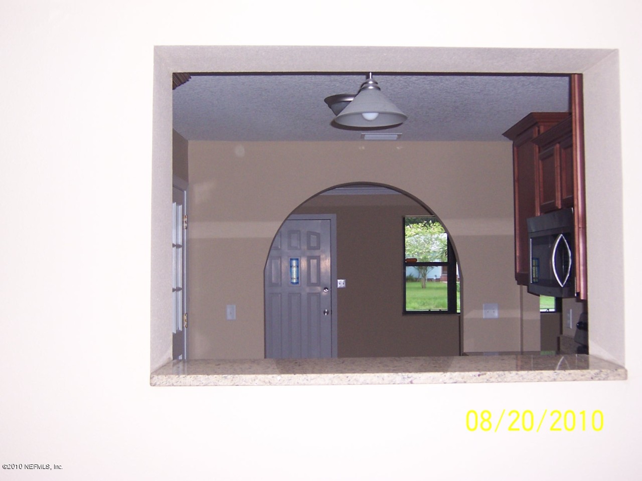 2003 E Road Jacksonville, FL 32216 - Photo 9 of 30 view through pass thru window to kitchen