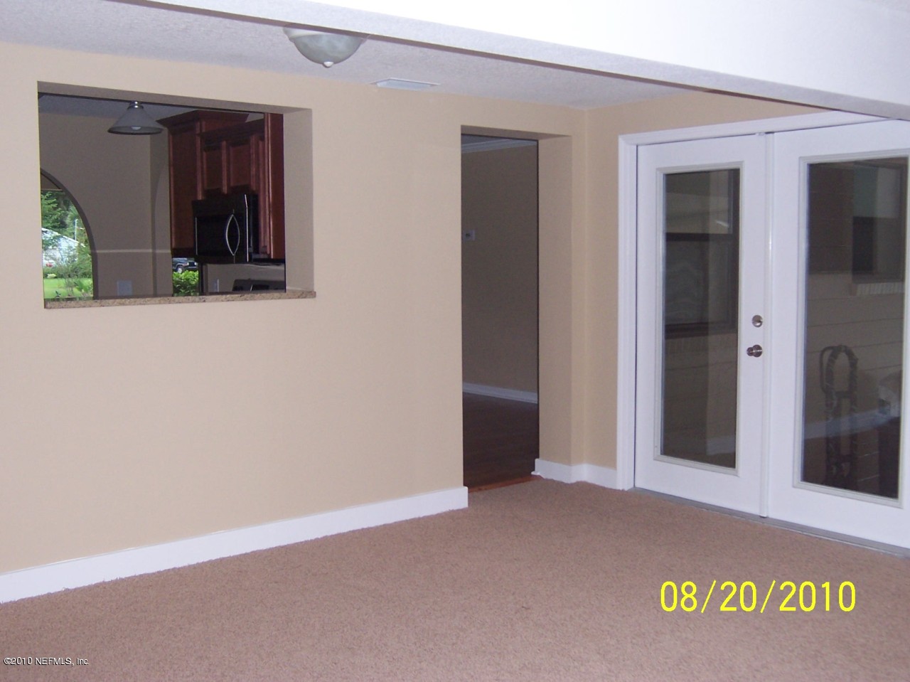 2003 E Road Jacksonville, FL 32216 - Photo 10 of 30 family room with pass through window