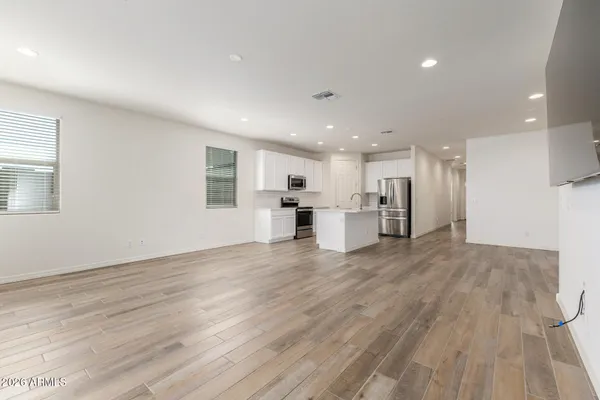a view of kitchen with wooden floor