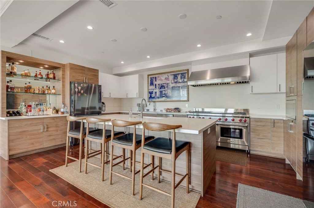 11837 Rideout Way Whittier, CA 90601 - Photo 10 of 44 a kitchen with a table and chairs in it