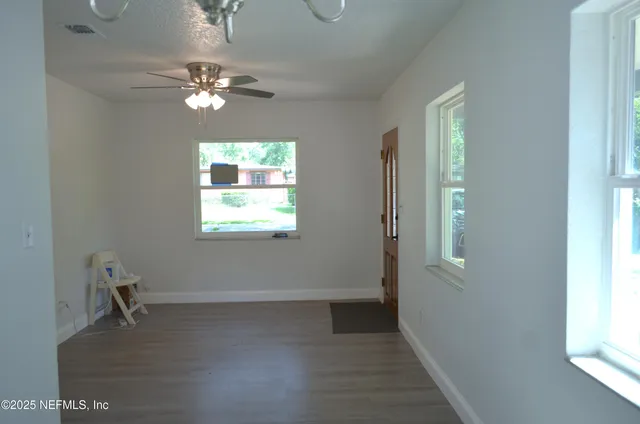 a view of a livingroom with a window