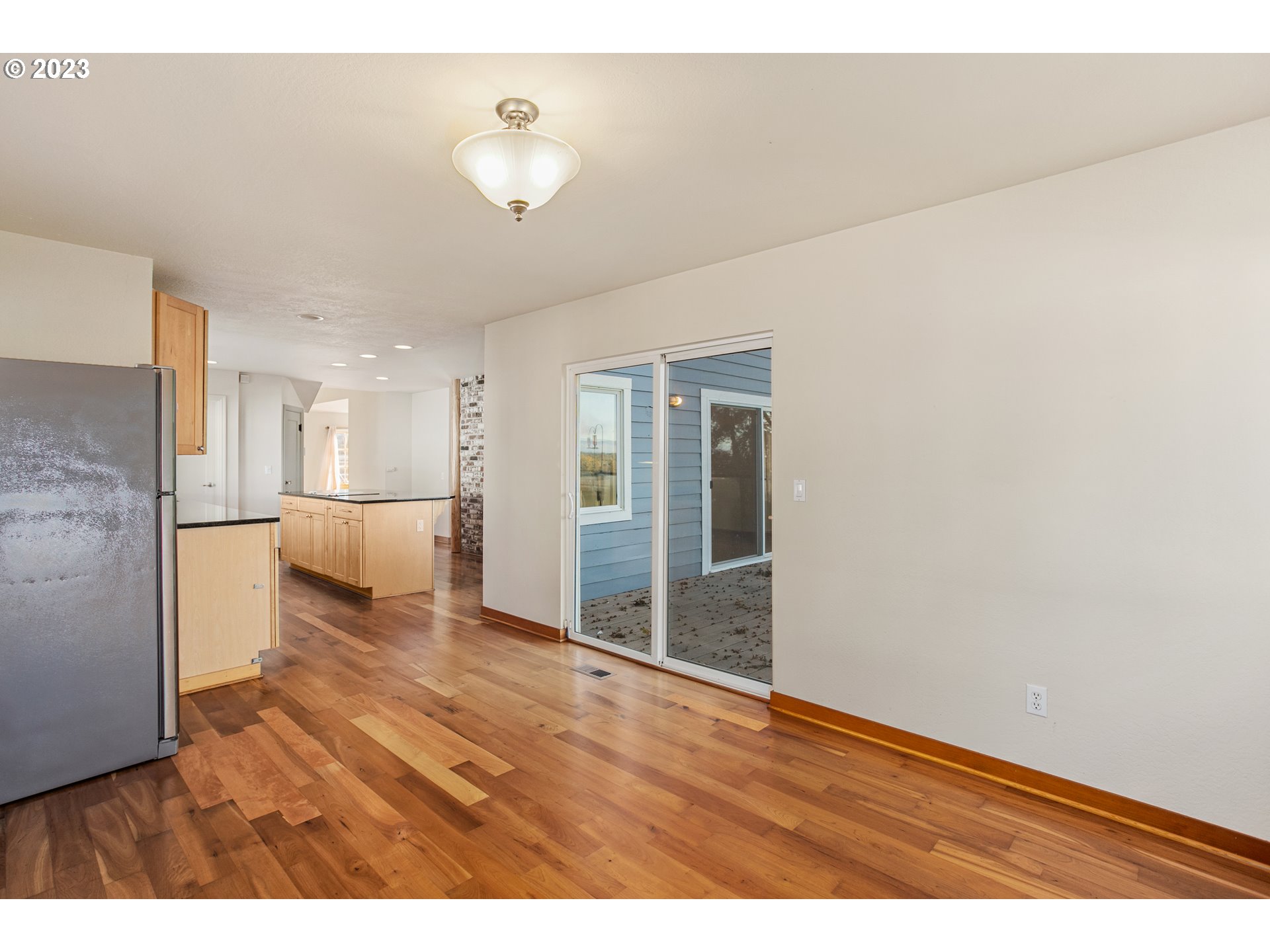 125 South Main Avenue Ridgefield, WA 98642 - Photo 12 of 35 a view of a room with wooden floor