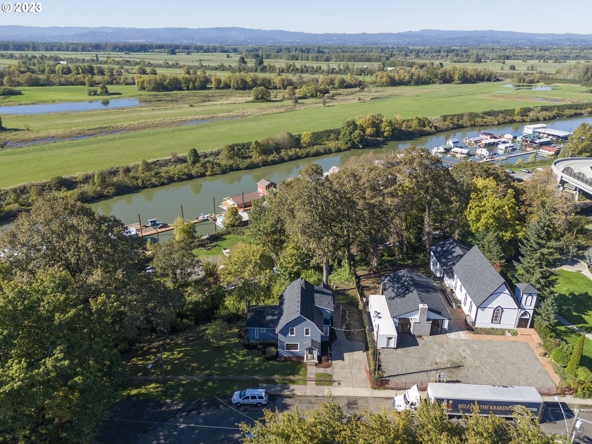 125 South Main Avenue Ridgefield, WA 98642 - Photo 34 of 35 an aerial view of a house with a lake view