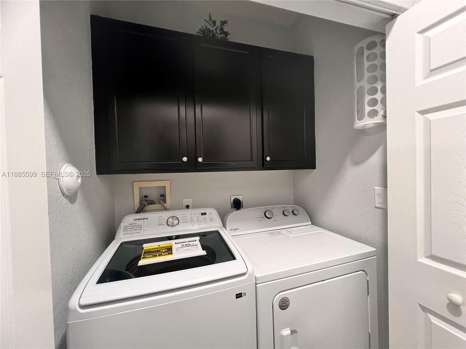 159 Southeast 34th Avenue Homestead, FL 33033 - Photo 17 of 27 a utility room with dryer and washer