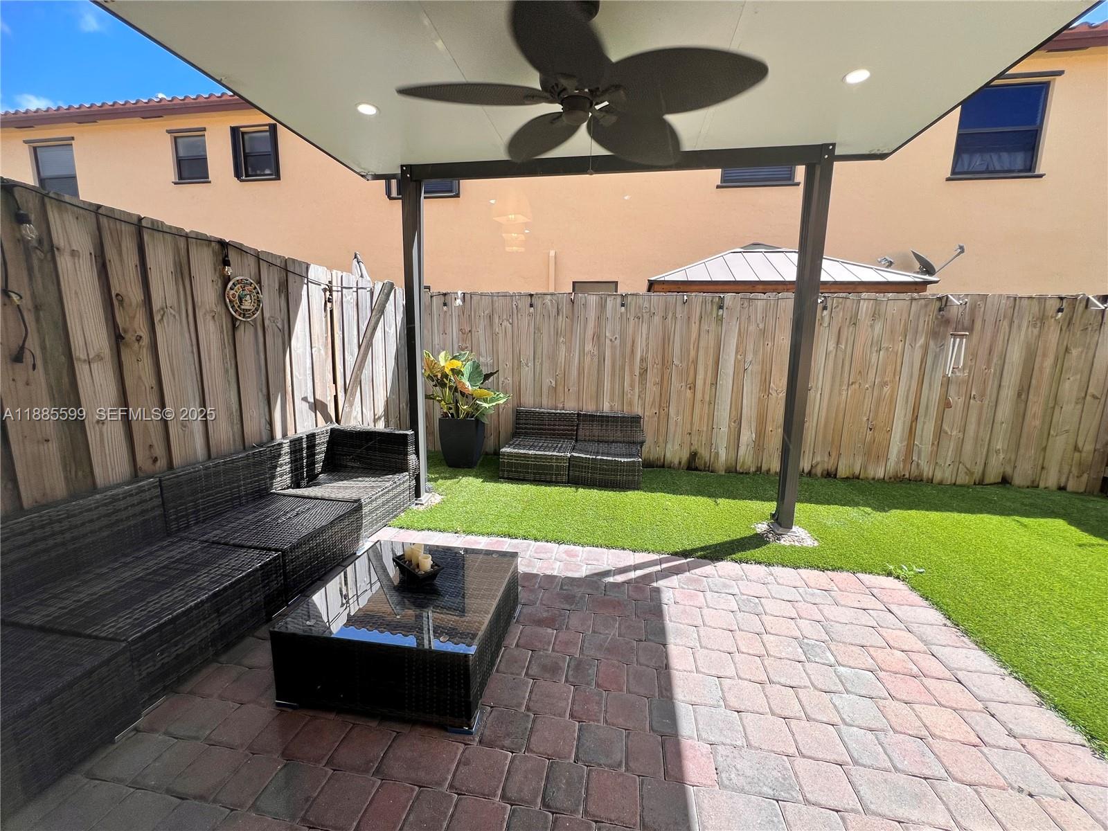 159 Southeast 34th Avenue Homestead, FL 33033 - Photo 18 of 27 a view of backyard with a patio