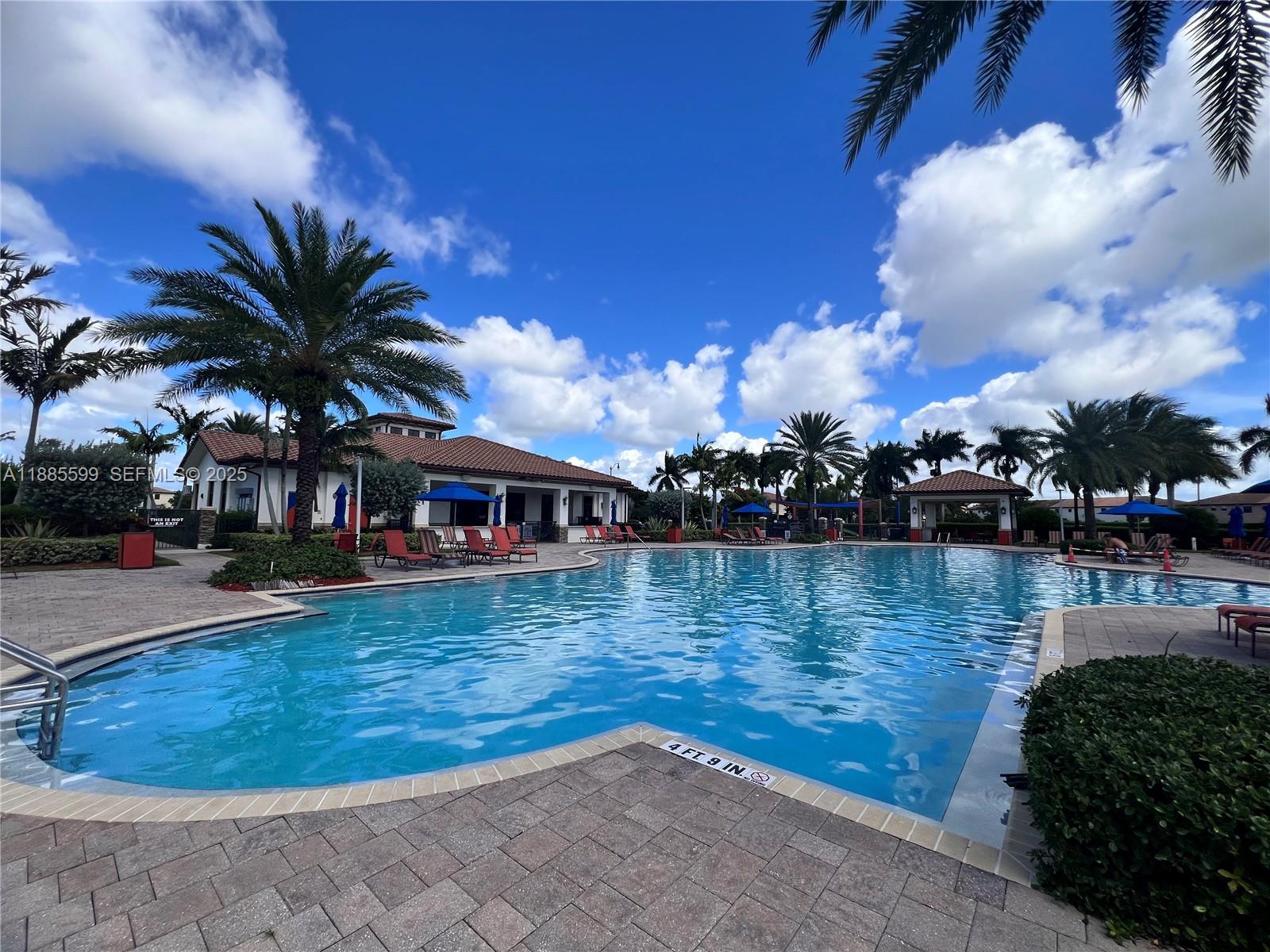 159 Southeast 34th Avenue Homestead, FL 33033 - Photo 23 of 27 a view of a fountain in front of house