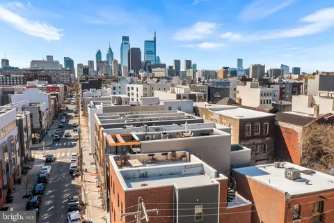 a city view with tall buildings