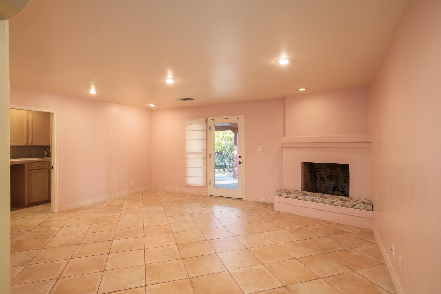 19282 East South Avenue Reedley, CA 93654 - Photo 20 of 33 a view of an empty room with a fireplace