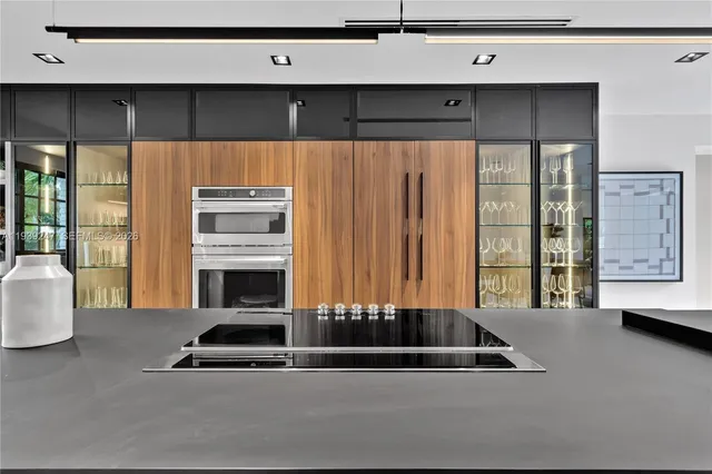 a bedroom with a bed and a television