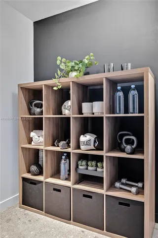 a view of a backyard with plants and patio