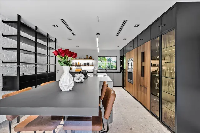 a view of a kitchen and dining room