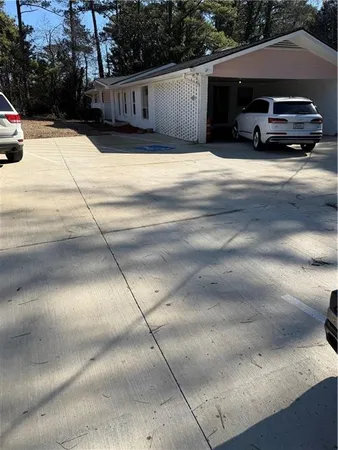 a car parked in front of a house