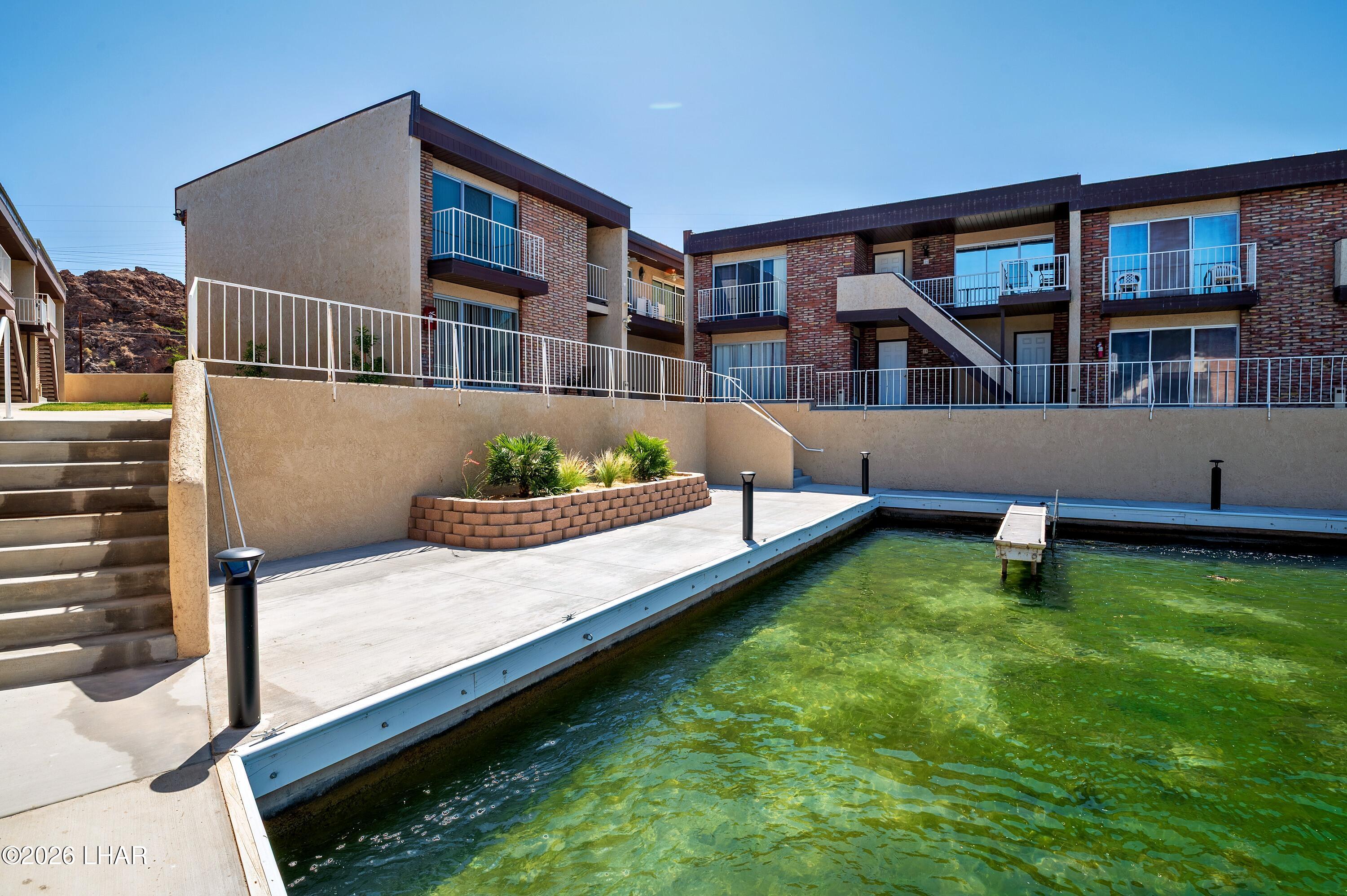 9170 Riverside Drive, Unit 13 Parker, AZ 85344 - Photo 43 of 51 a house view with a sitting space and sitting space
