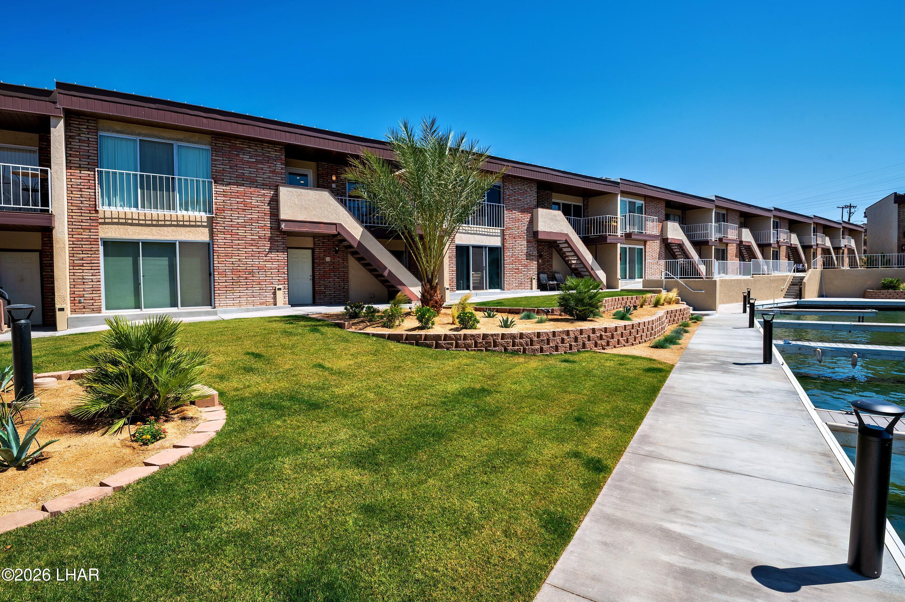 9170 Riverside Drive, Unit 13 Parker, AZ 85344 - Photo 46 of 51 a front view of house with yard