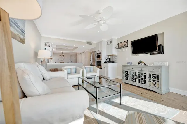 a kitchen with stainless steel appliances a sink cabinets and refrigerator