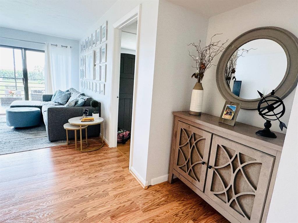 9300 Southwest 8th Street, Unit 214 Boca Raton, FL 33428 - Photo 1 of 32 a living room with furniture and a large window