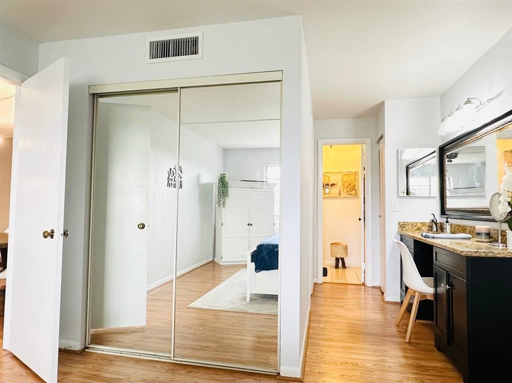 9300 Southwest 8th Street, Unit 214 Boca Raton, FL 33428 - Photo 26 of 32 a living room with stainless steel appliances granite countertop furniture and a table