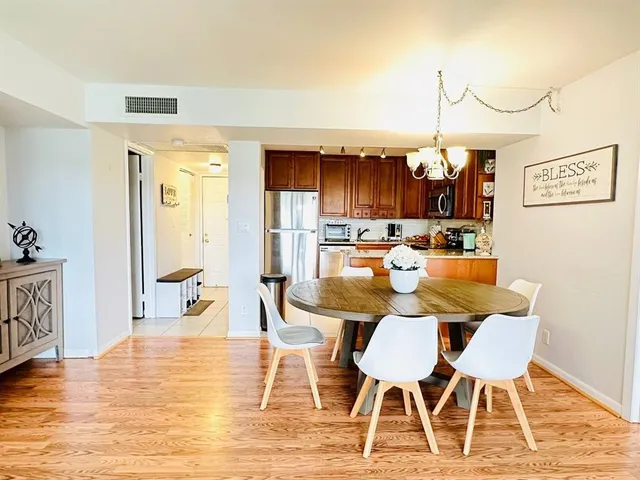 a view of a dining room with furniture