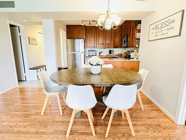 a view of a dining room with furniture