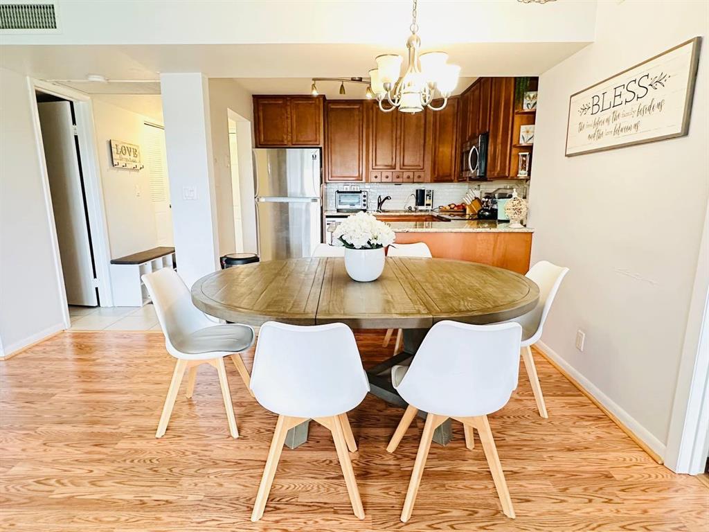 9300 Southwest 8th Street, Unit 214 Boca Raton, FL 33428 - Photo 7 of 32 a view of a dining room with furniture
