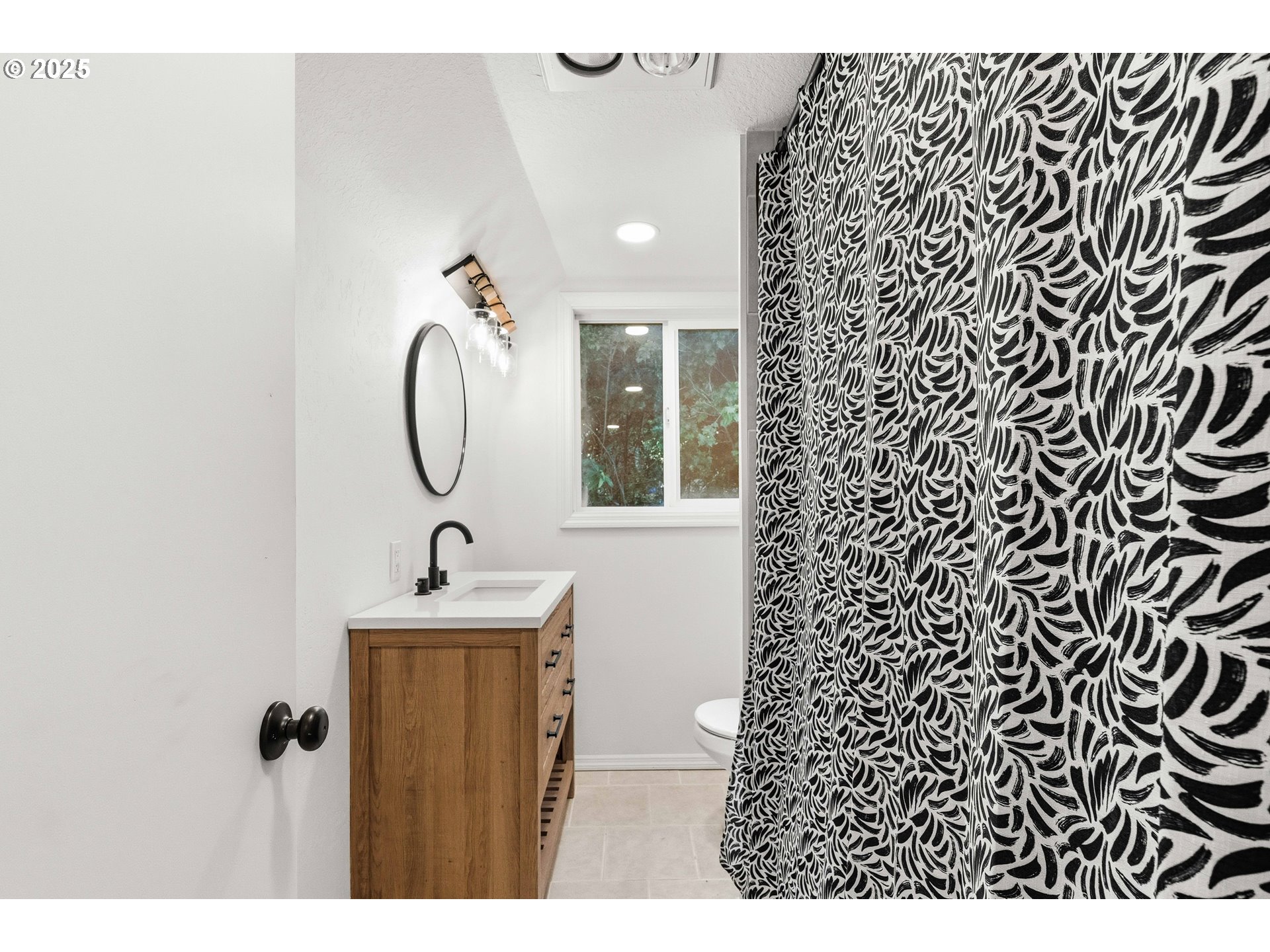 62356 Olive Barber Road Coos Bay, OR 97420 - Photo 31 of 34 a bathroom with a sink and a mirror
