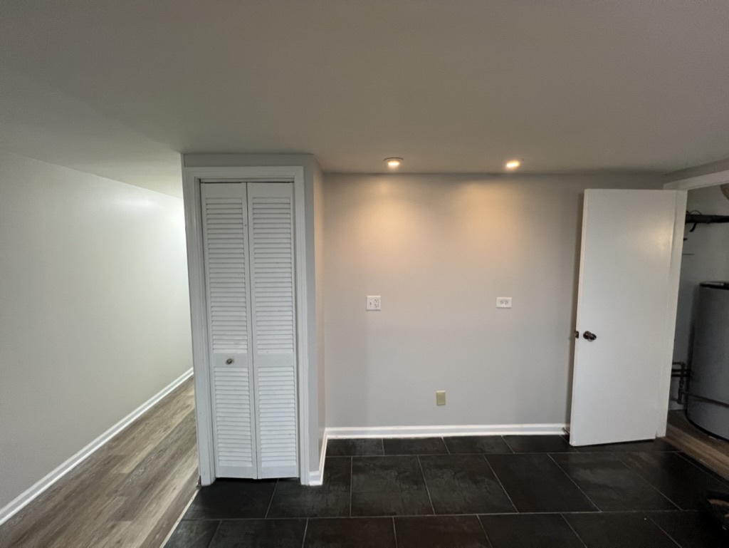 26835 South Linden Lane Crete, IL 60417 - Photo 4 of 31 an empty room with wooden floor and entrance