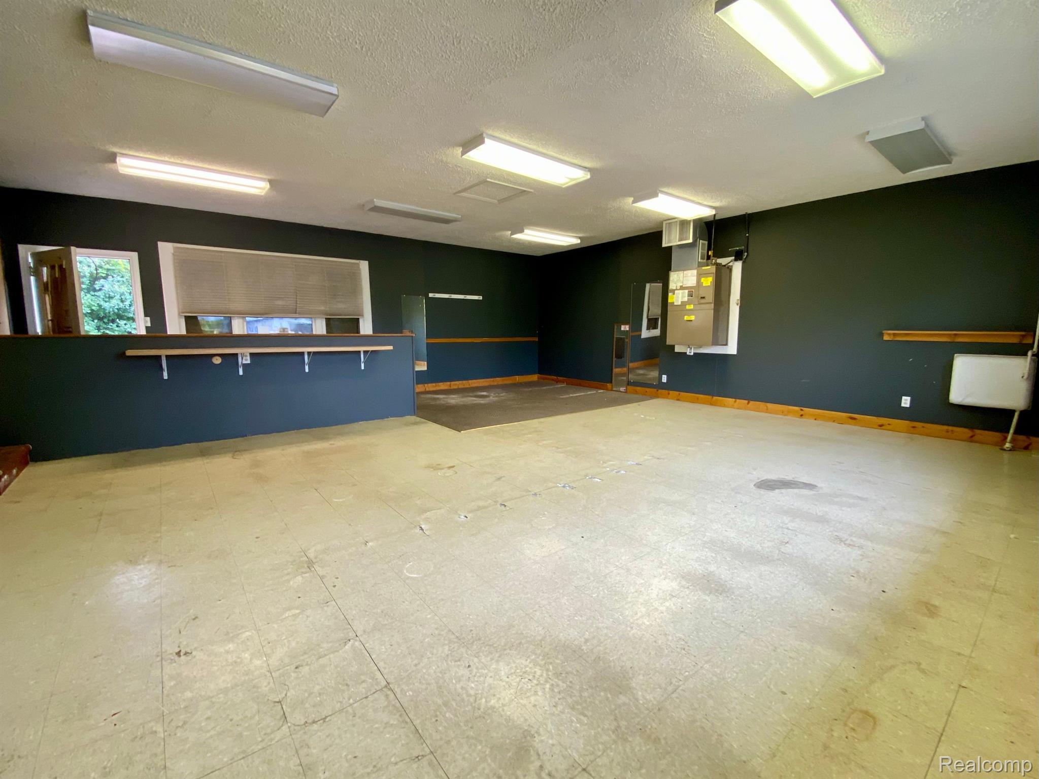 4241 Lennon Road Flint, MI 48507 - Photo 3 of 17 converted Garage / SHOP AREA