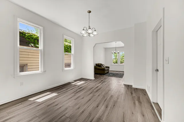 a view of livingroom with hardwood floor and ceiling fan