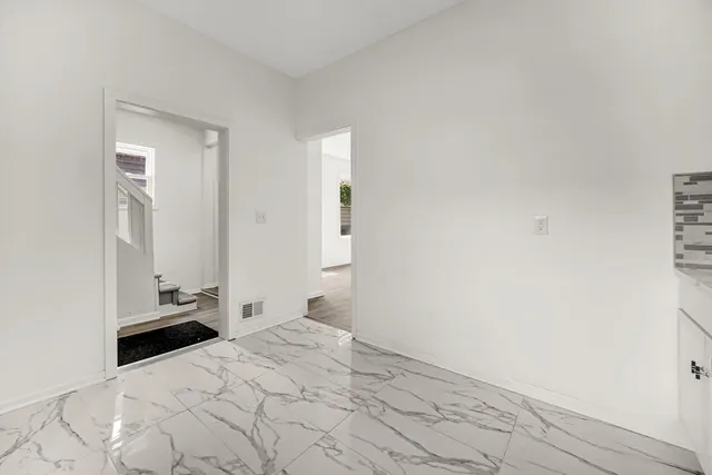 a bedroom with a bed and a cabinets