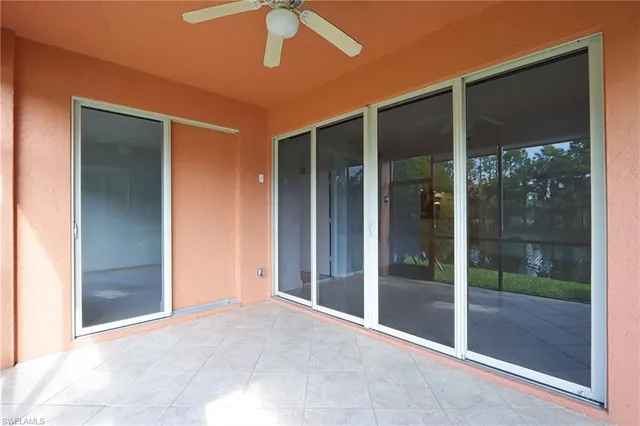 a view of a glass door with a balcony