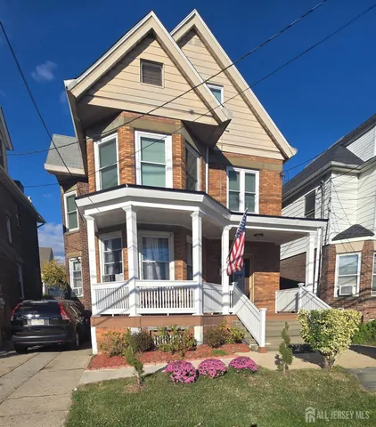 a front view of a house with yard