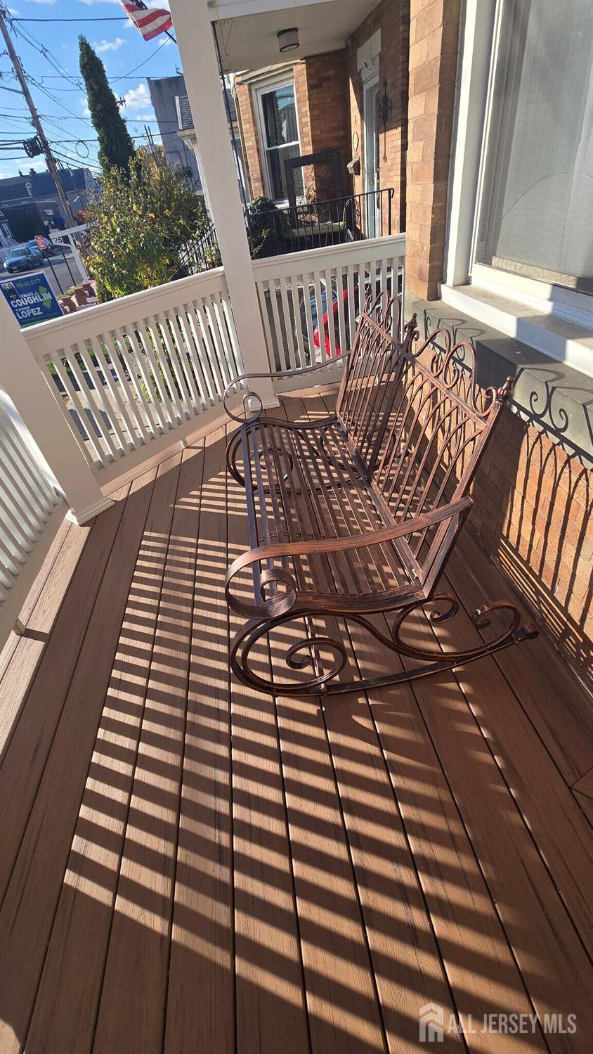 272 Market Street Perth Amboy, NJ 08861 - Photo 2 of 20 a view of balcony with wooden floor