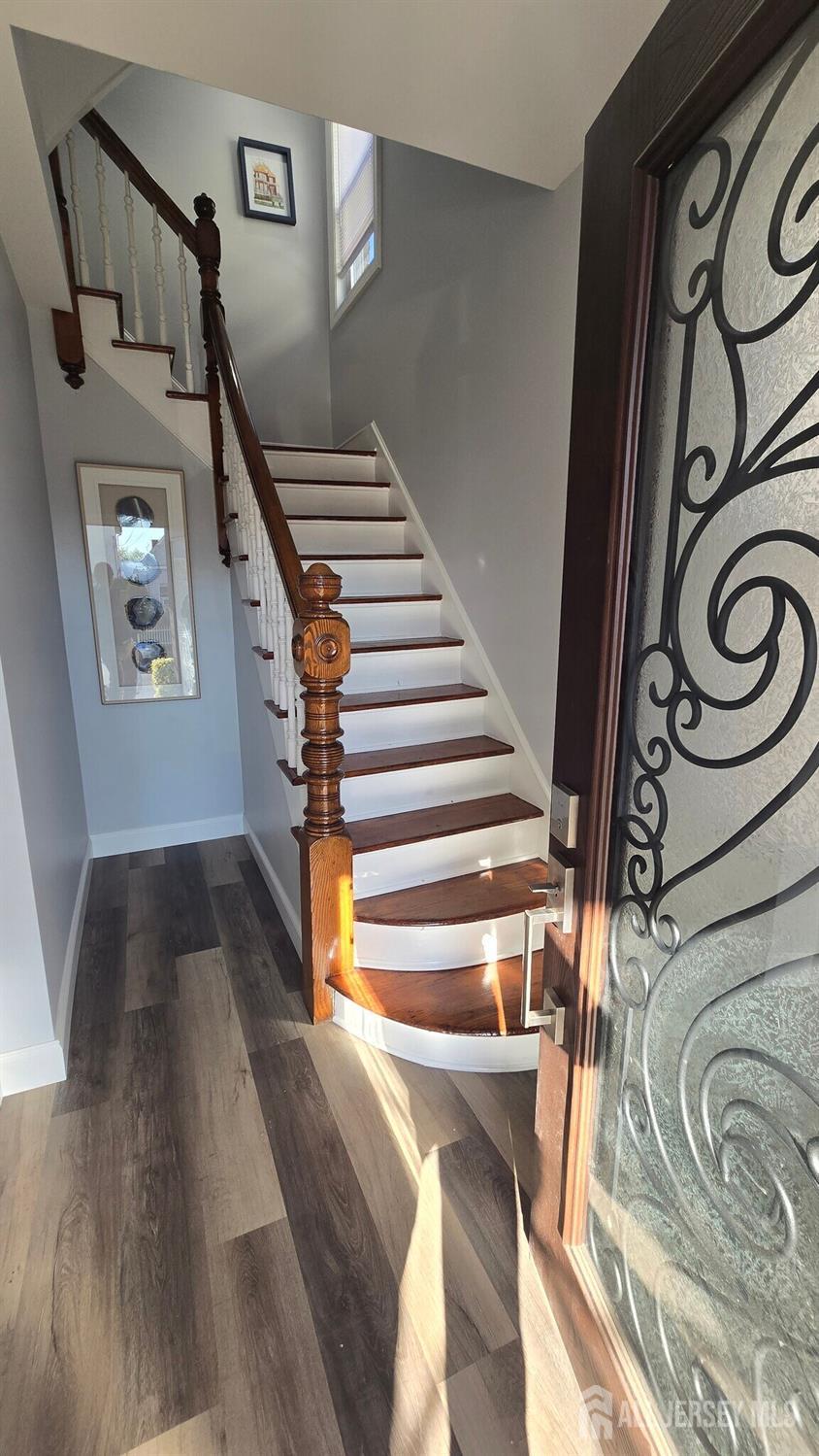272 Market Street Perth Amboy, NJ 08861 - Photo 3 of 20 a view of entryway and hall with wooden floor