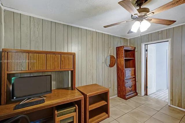 a workspace with furniture and window